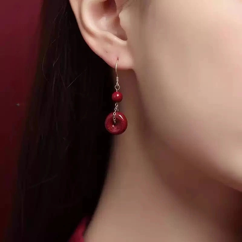 Cinnabar earrings--Get Love