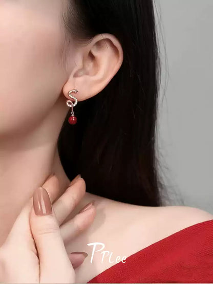 Cinnabar earrings - remove bad luck